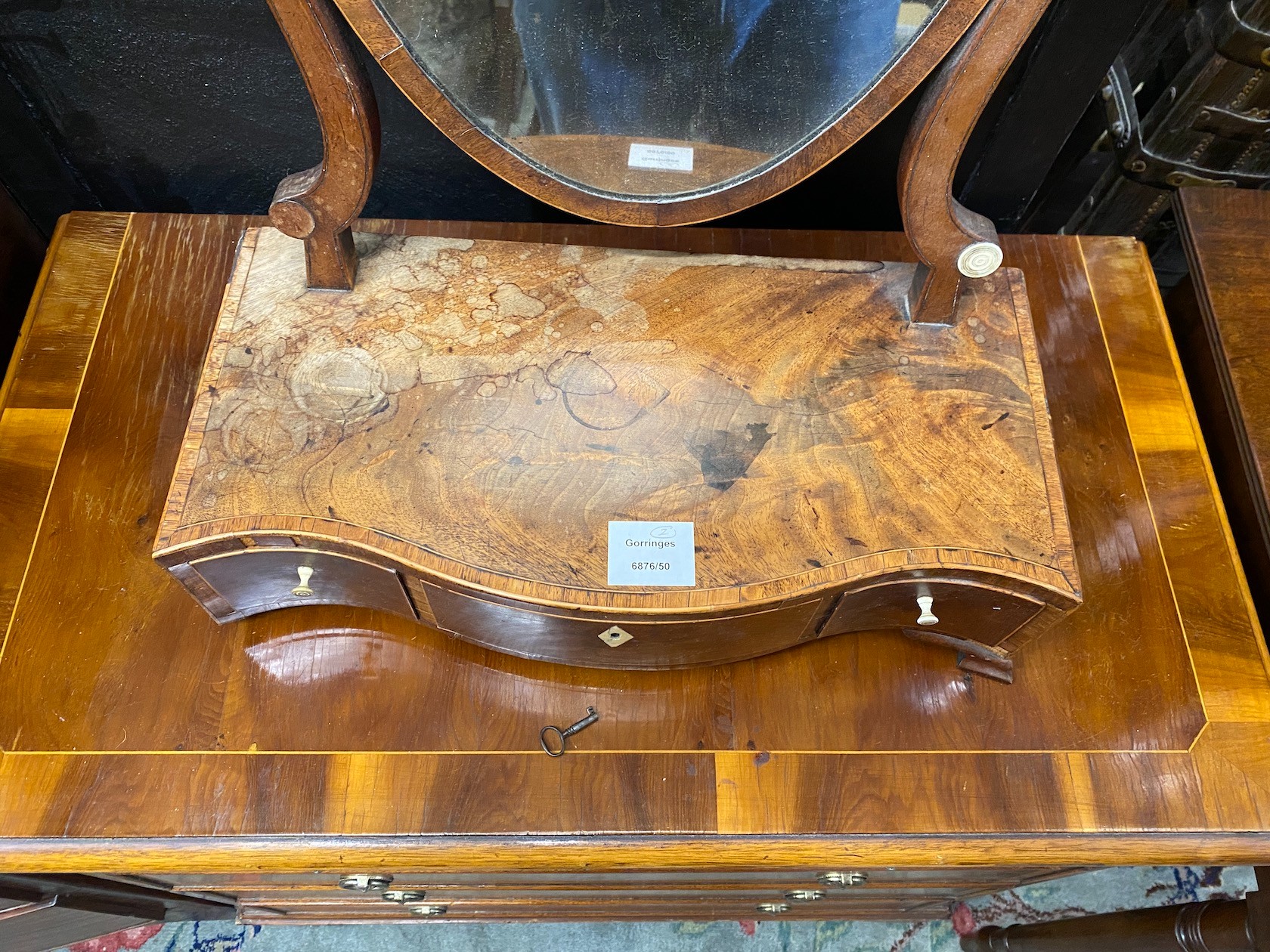 A George III style banded and inlaid yew veneered chest of drawers, width 77cm, depth 42cm, height 75cm